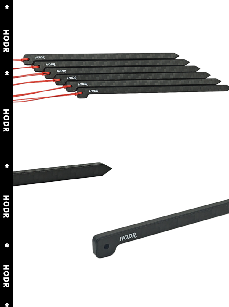 Carbon fiber tent stakes bundled together for easy packing