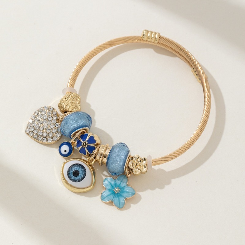 Pärlarmband med blått öga och hjärta med strass_voghion.com