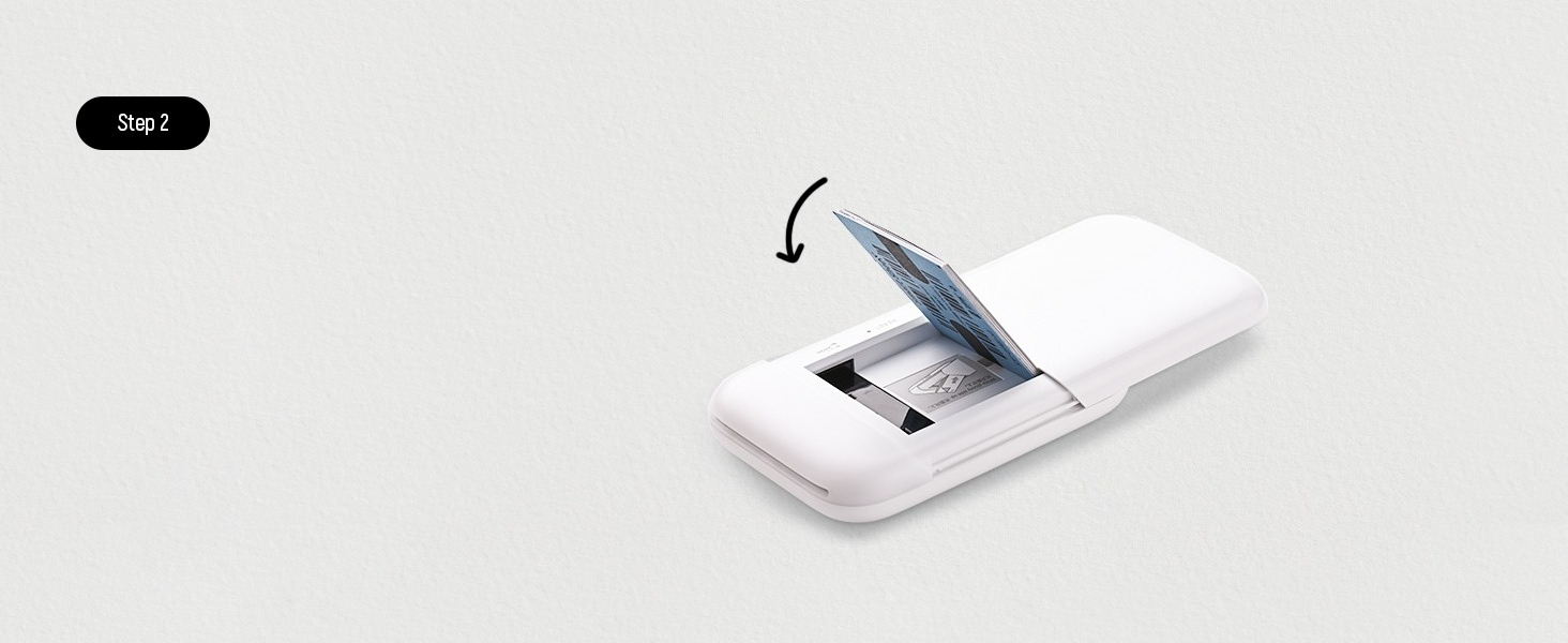 White electronic device shown in profile, demonstrating paper or card insertion through a slot with a curved arrow indicating direction.